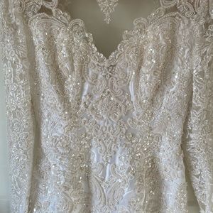 The perfect Bridal Gown with detachable train.